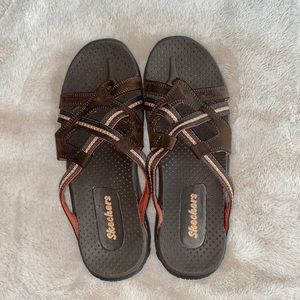 Brown and peach color Skechers sandals